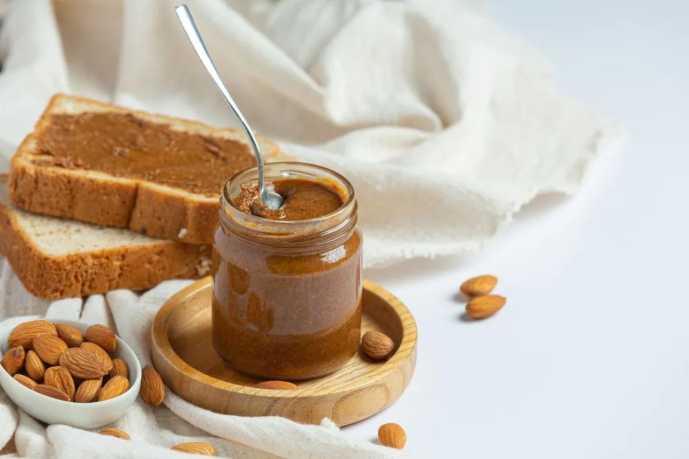 raw-organic-almond-butter-white-background.jpg?format=webp